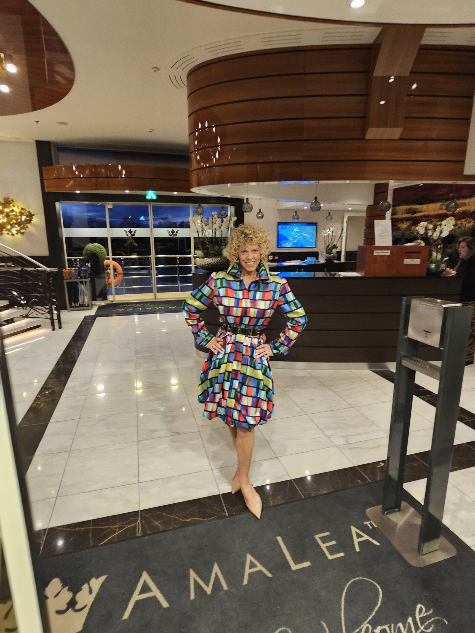 River vs Ocean Cruise. GG standing inside the AmaLea river cruise ship