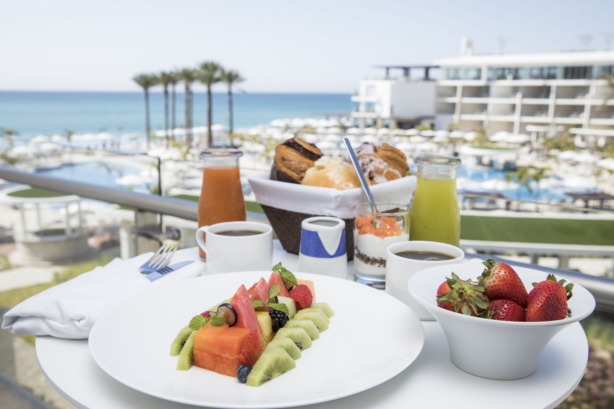breakfast on the balcony with a view of the ocean; from blog Le Blanc Resort Cabo Review