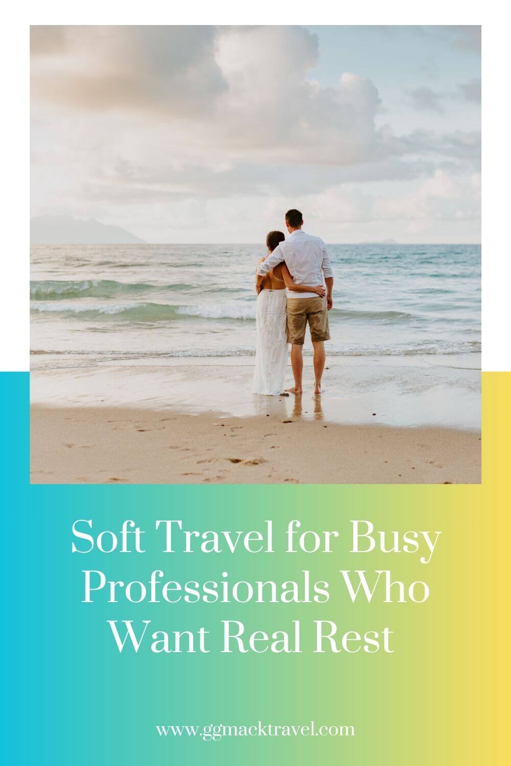 couple hugging on the beach with their backs to camera.  she's wearing awhile flowy dress and he has on shorts and a shirt from blog post Soft Travel for Busy Professionals