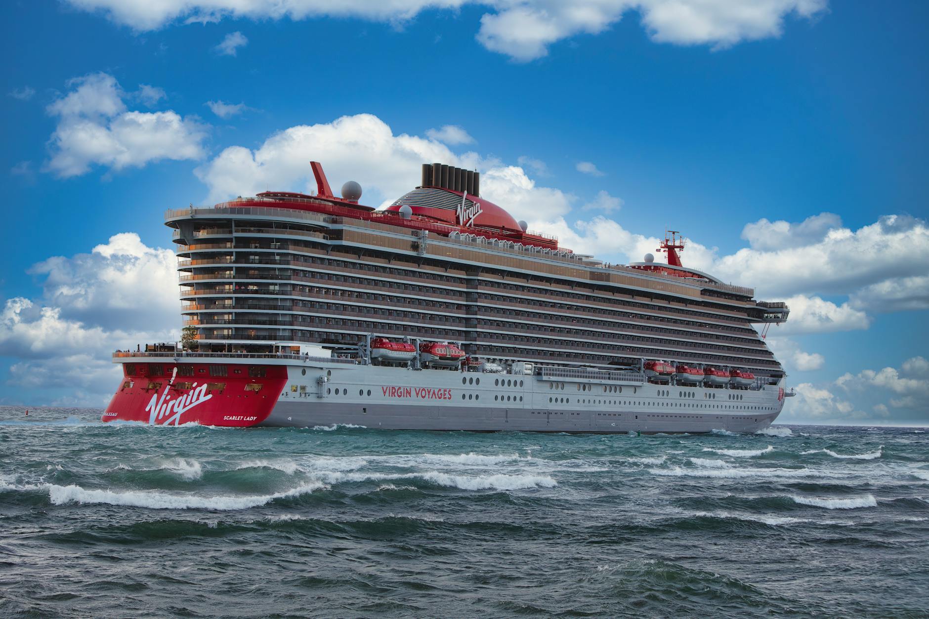 cruise ship scarlet lady on the ocean from blog Celebrity cruises vs virgin voyages