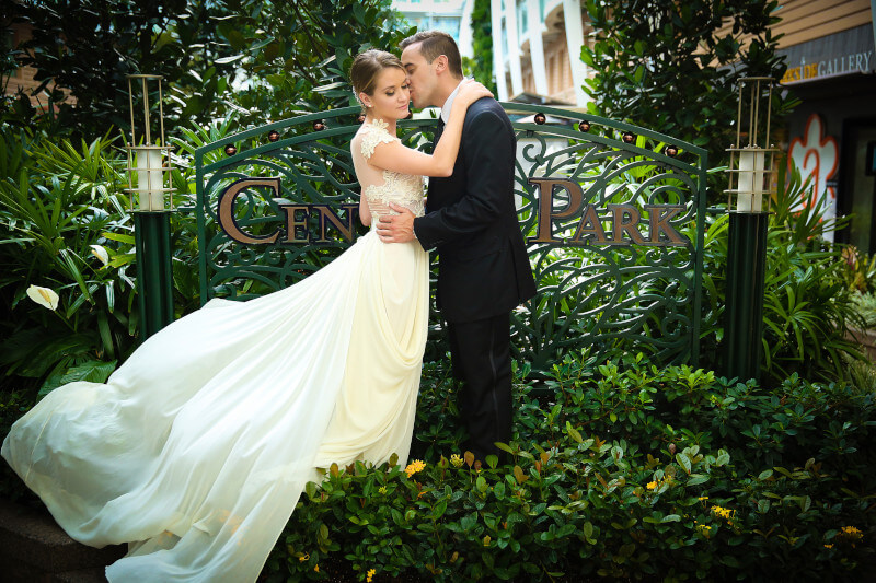 wedding couple kissing in the central park area of cruise ship from blog post Micro Weddings