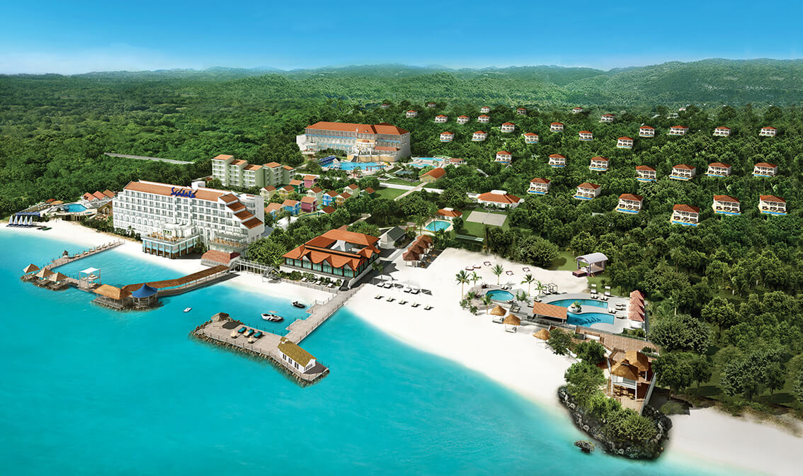 overhead view of Sandals Ochi in Jamaica.  Ocean, beach and expansive resort. from blog post Best Sandals resorts